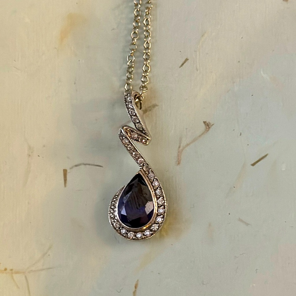 Swarovski sapphire pendant with crystals in silver setting with chain.